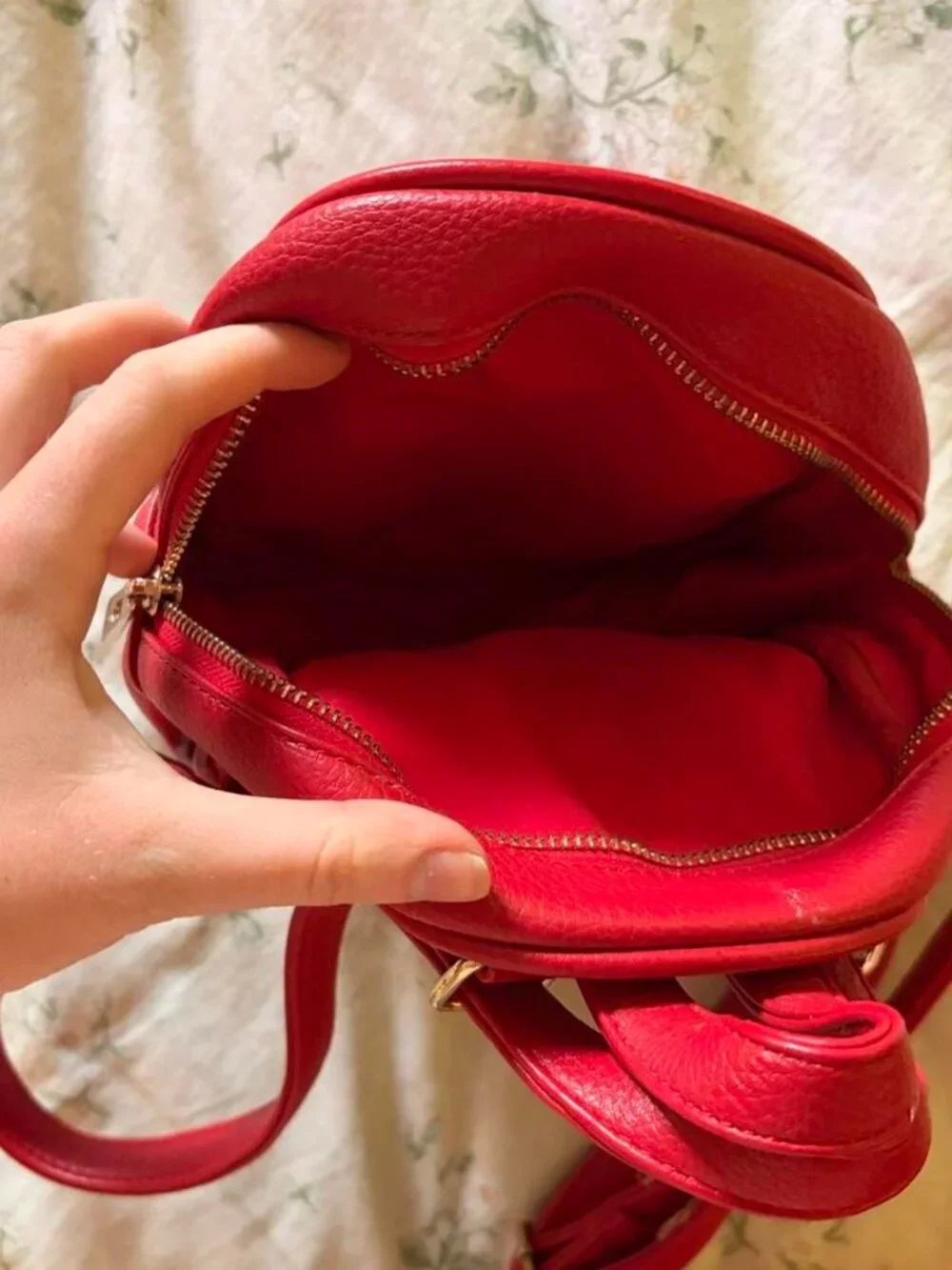 Red mini backpack with gold hardware